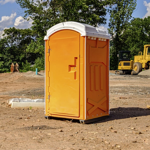 how often are the porta potties cleaned and serviced during a rental period in Bushong